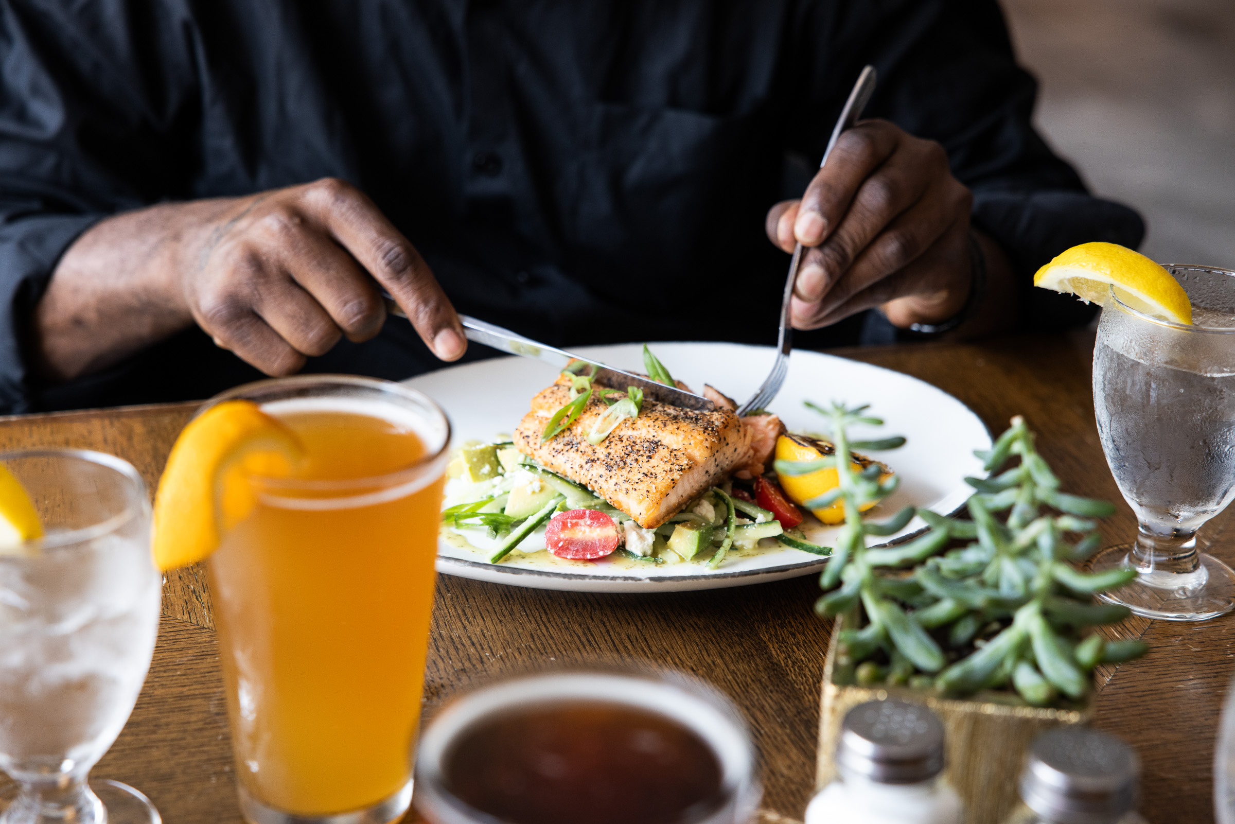 Pan-Seared Salmon being cut into to enjoy